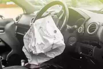 Picture of inside of car after an exploding ARC airbag exploded on driver's side