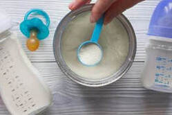 Picture of scoop and recalled alimetum baby formula
